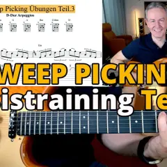 Mann spielt Gitarre, Noten und Akkorde für Sweep Picking Übungen.